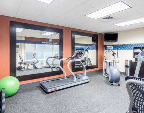 Fitness center with treadmills and weights at the Hampton Inn & Suites West Little Rock.