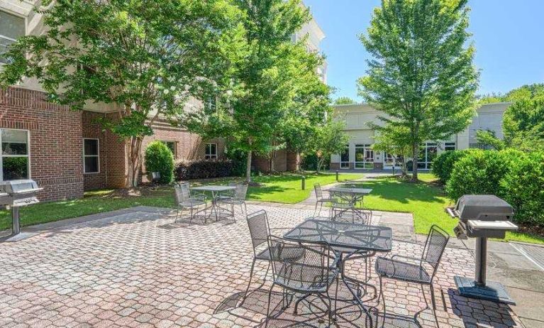 Outdoor garden area suitable as workspace at the Hampton Inn & Suites West Little Rock.