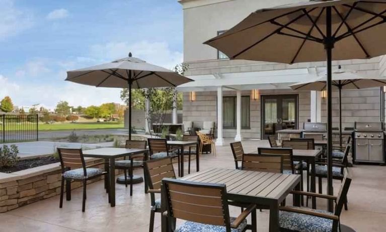 Outdoor patio suitable as workspace at the Tru by Hilton Albany Crossgates Mall.