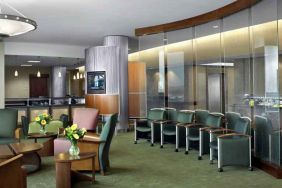 Beautiful lobby area with lounges and chairs perfect as workspace at the DoubleTree by Hilton Omaha-Downtown.