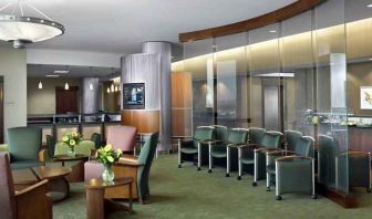 Beautiful lobby area with lounges and chairs perfect as workspace at the DoubleTree by Hilton Omaha-Downtown.