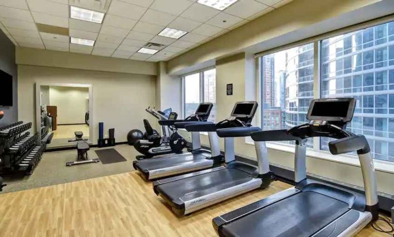 Fitness center with treadmills at the Embassy Suites by Hilton Chicago Magnificent Mile.