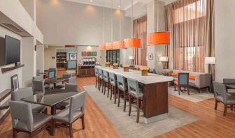 Stylish dining area perfect as workplace at the Hampton Inn & Suites Schererville.