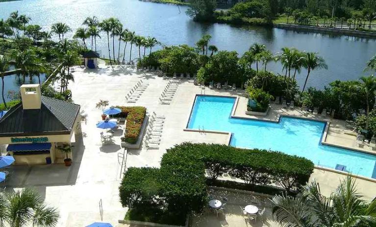 Stunning aerial view of the outdoor pool by the lagoon at the Hilton Miami Airport Blue Lagoon.