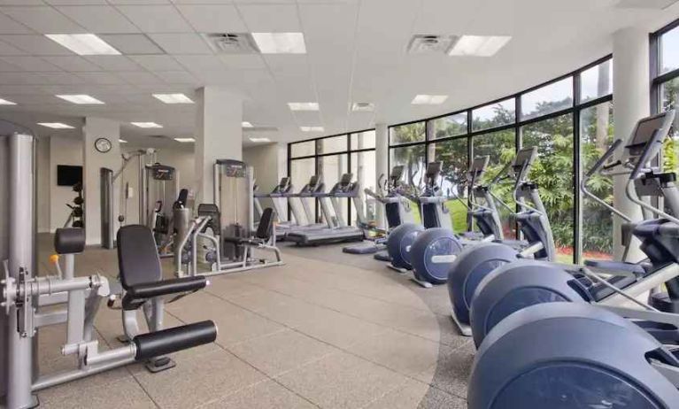 Fully equipped fitness center at the Hilton Miami Airport Blue Lagoon.