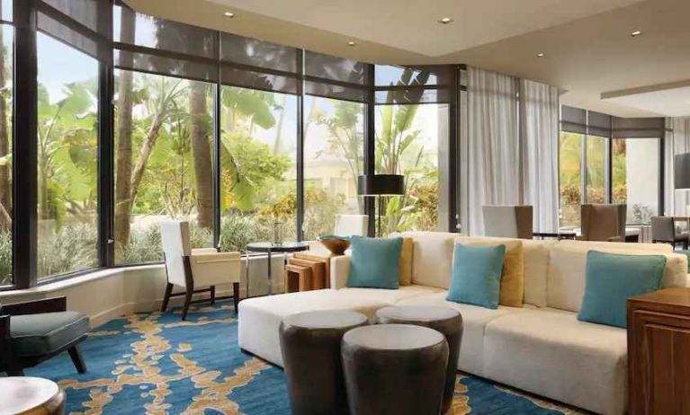 Bright workspace with lounges and chairs at the Hilton Miami Airport Blue Lagoon.