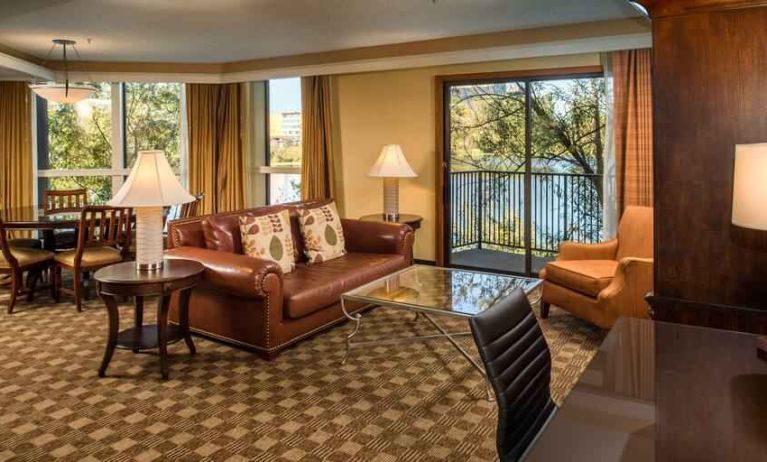 Spacious living room with working station at the DoubleTree by Hilton Seattle Airport.