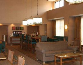 Comfortable lobby area perfect as workplace at the Hampton Inn & Suites Riverton, WY.