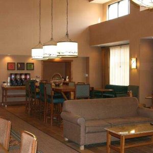 Comfortable lobby area perfect as workplace at the Hampton Inn & Suites Riverton, WY.