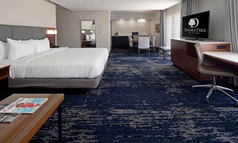 Spacious king suite with work desk and lounge area at DoubleTree by Hilton Hotel Bakersfield.