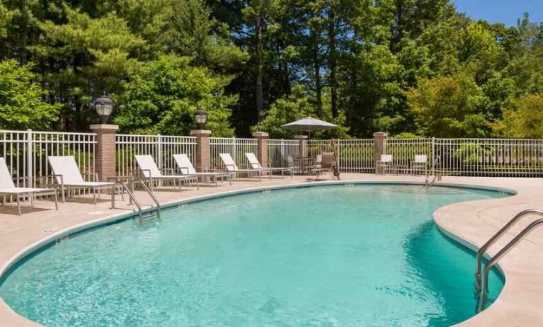 Relaxing outdoor pool at the Hampton Inn Boston Bedford Burlington.