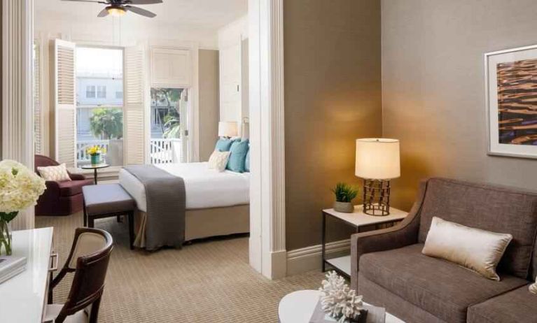 Spacious living room with working station in a king suite at the Hotel del Coronado, Curio Collection by Hilton.