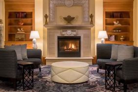 Comfortable workspace by the fireplace at the Embassy Suites by Hilton Portland-Downtown.