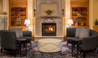 Comfortable workspace by the fireplace at the Embassy Suites by Hilton Portland-Downtown.