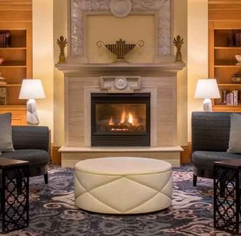 Comfortable workspace by the fireplace at the Embassy Suites by Hilton Portland-Downtown.