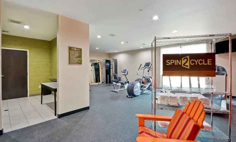 well-equipped fitness center and cycle studio at Home2 Suites by Hilton Fort Worth Southwest Cityview.