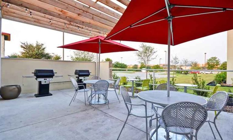 Relaxing outdoor patio for coworking and down time at Home2 Suites by Hilton Fort Worth Southwest Cityview.