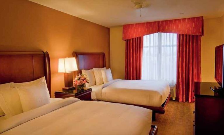 luxurious queen room with TV at Homewood Suites by Hilton Rockville-Gaithersburg.