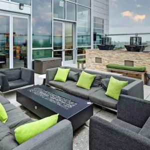 Outdoor terrace with lounges perfect as workspace at the Hilton Garden Inn Chicago McCormick Place