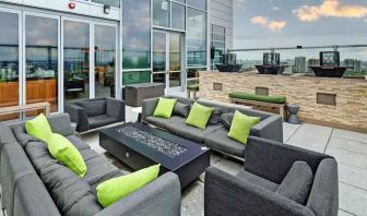 Outdoor terrace with lounges perfect as workspace at the Hilton Garden Inn Chicago McCormick Place