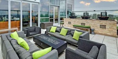 Outdoor terrace with lounges perfect as workspace at the Hilton Garden Inn Chicago McCormick Place