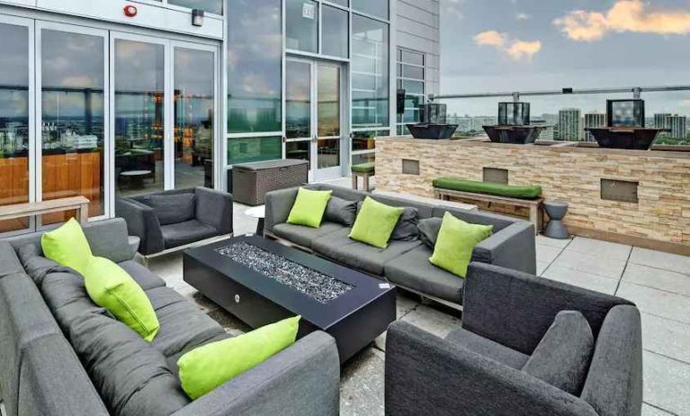 Outdoor terrace with lounges perfect as workspace at the Hilton Garden Inn Chicago McCormick Place