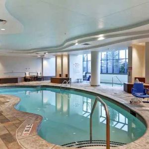 Relaxing indoor pool area at the Embassy Suites by Hilton Minneapolis-Airport.