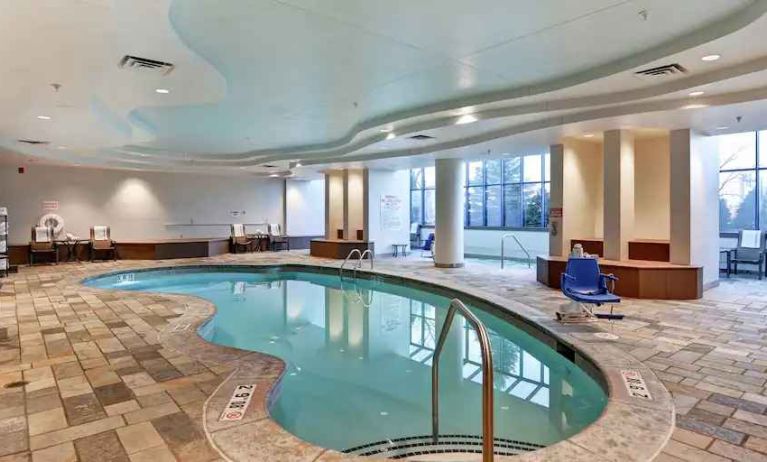 Relaxing indoor pool area at the Embassy Suites by Hilton Minneapolis-Airport.