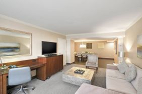 Elegant and spacious presidential suite with working station at the Hilton Crystal City at Washington Reagan National Airport.