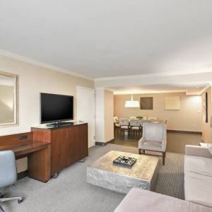 Elegant and spacious presidential suite with working station at the Hilton Crystal City at Washington Reagan National Airport.