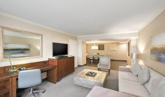 Elegant and spacious presidential suite with working station at the Hilton Crystal City at Washington Reagan National Airport.