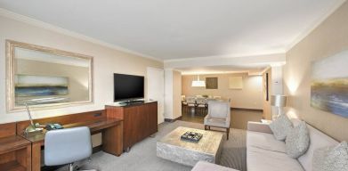 Elegant and spacious presidential suite with working station at the Hilton Crystal City at Washington Reagan National Airport.