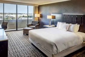 Comfortable king suite with city view at the Hilton Sacramento-Arden West.