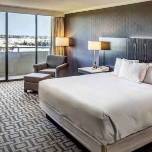 Comfortable king suite with city view at the Hilton Sacramento-Arden West.