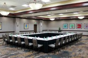 Meeting room with square conference table at the Hilton Sacramento-Arden West.