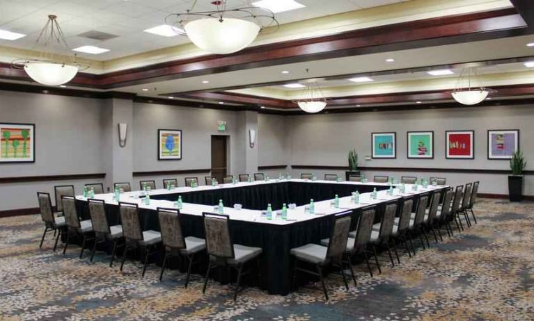 Meeting room with square conference table at the Hilton Sacramento-Arden West.