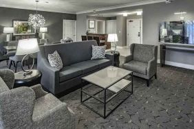 Comfortable living room in a king suite at the DoubleTree by Hilton Modesto.