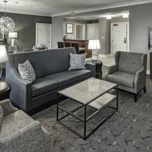 Comfortable living room in a king suite at the DoubleTree by Hilton Modesto.