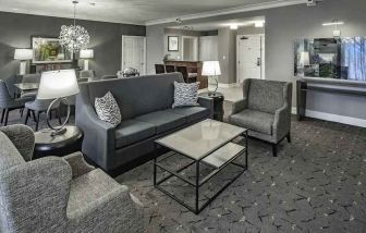 Comfortable living room in a king suite at the DoubleTree by Hilton Modesto.