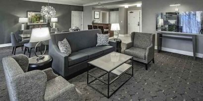 Comfortable living room in a king suite at the DoubleTree by Hilton Modesto.