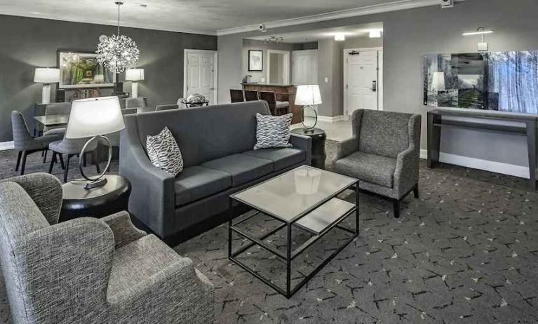 Comfortable living room in a king suite at the DoubleTree by Hilton Modesto.