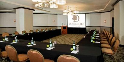 Large meeting room with big screen at the DoubleTree by Hilton Modesto.