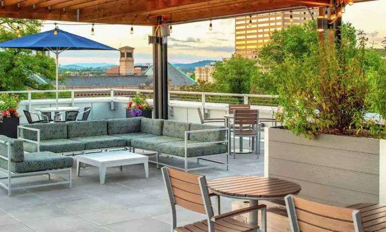 Beautiful workspace in a rooftop patio at the Hampton Inn & Suites by Hilton Portland-Pearl District.