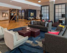 Comfortable lobby area perfect as workspace at the Hampton Inn & Suites by Hilton Portland-Pearl District.