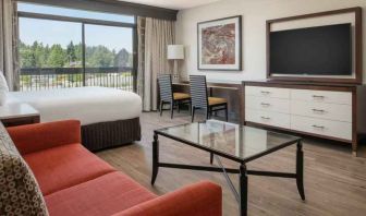 Comfortable living room with working station at the Hilton Bellevue.