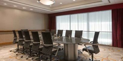 Meeting room with round table at the Hilton Baltimore BWI Airport.