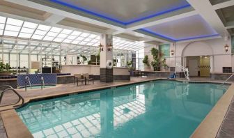 Relaxing indoor pool area at the Embassy Suites by Hilton San Francisco Airport Waterfront.