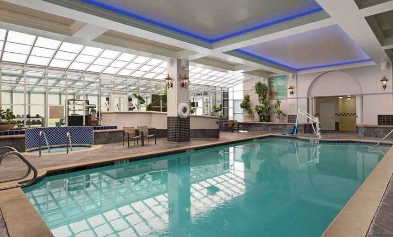 Relaxing indoor pool area at the Embassy Suites by Hilton San Francisco Airport Waterfront.