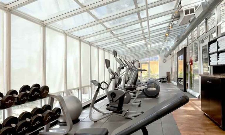 Bright fitness center at the Embassy Suites by Hilton San Francisco Airport Waterfront.