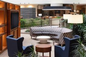 Elegant workspace in a hotel lobby at the Embassy Suites by Hilton San Francisco Airport.